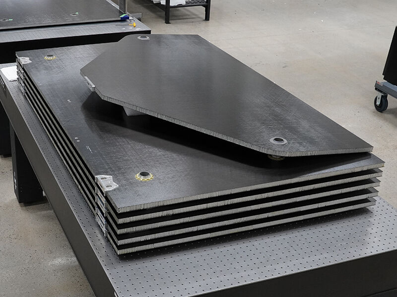 Solar wing Stack of carbon fiber panels with precision inserts that make up a solar wing.  Corner isotropic view.