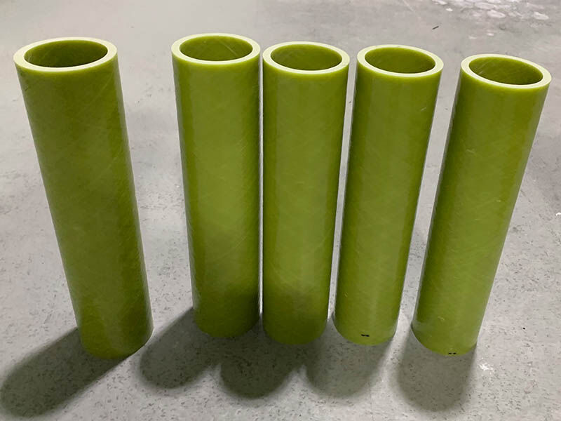 Battery tubes Yellow battery tubes. 5 standing on a warehouse floor