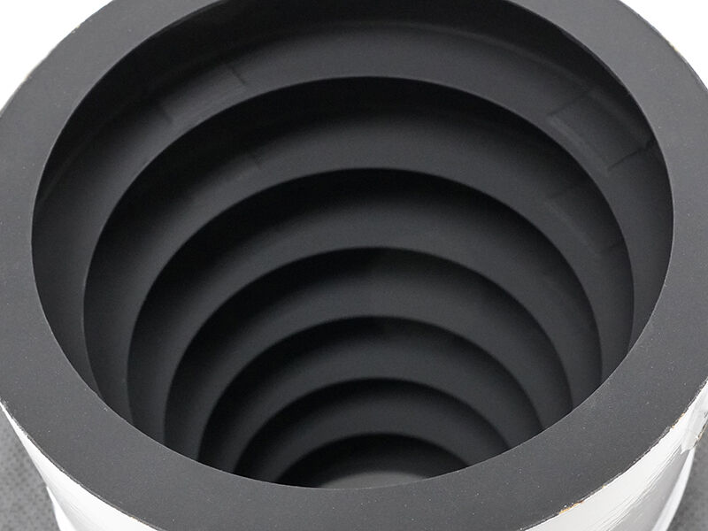 Sunshade, interior Image shows the interior of a sunshade structure. The interior is carbon fiber (black) and there are layers of cylindrical cutouts evenly spaced down the interior.