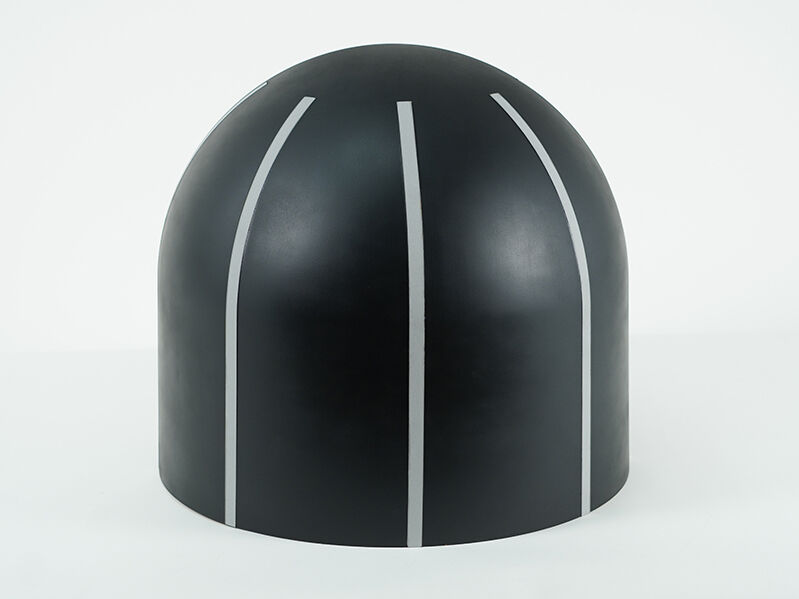 Flight radome with lightning diverters Satcom aircraft radome. Black paint exterior with white lightning diverters.