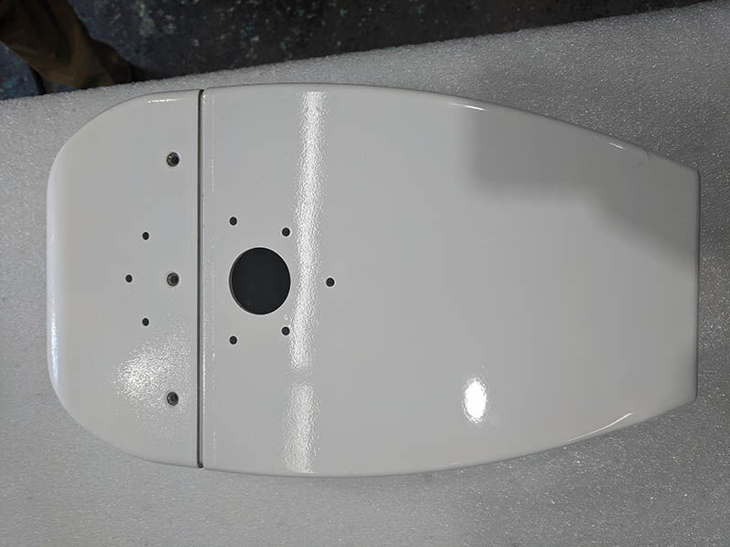 Radome prototype Radome prototype, painted white, sitting on white surface.