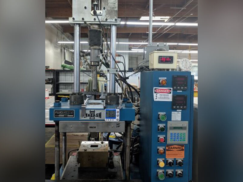 Carbon fibers being compression molded for frac plug