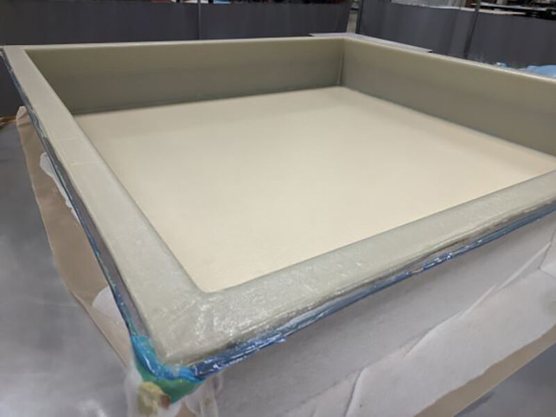 Radome under manufacture (debulking) Radome under manufacture. Composite material is laid up in a tool, bagged, and under a vacuum to debulk the material before the next stage of the manufacturing process.