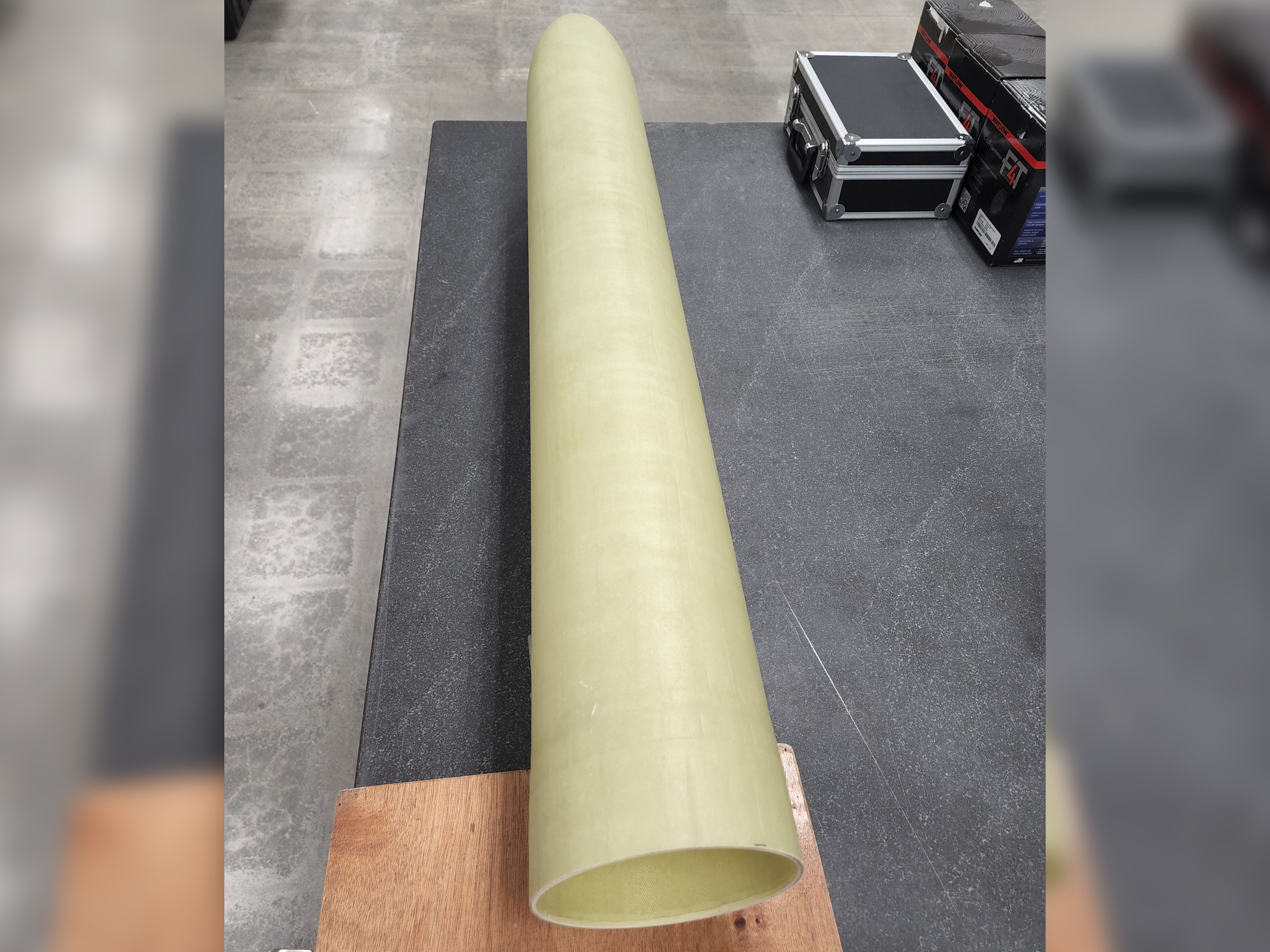 Underwater RF apparatus Underwater RF apparatus. Fiberglass long conical shape sitting on a granite table.